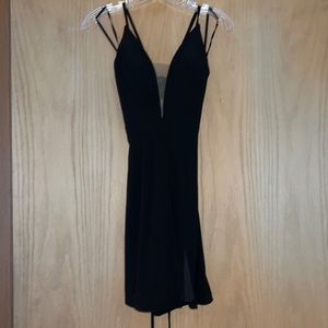 Black Faviana bodycon dress, ties in the back, slit in the front